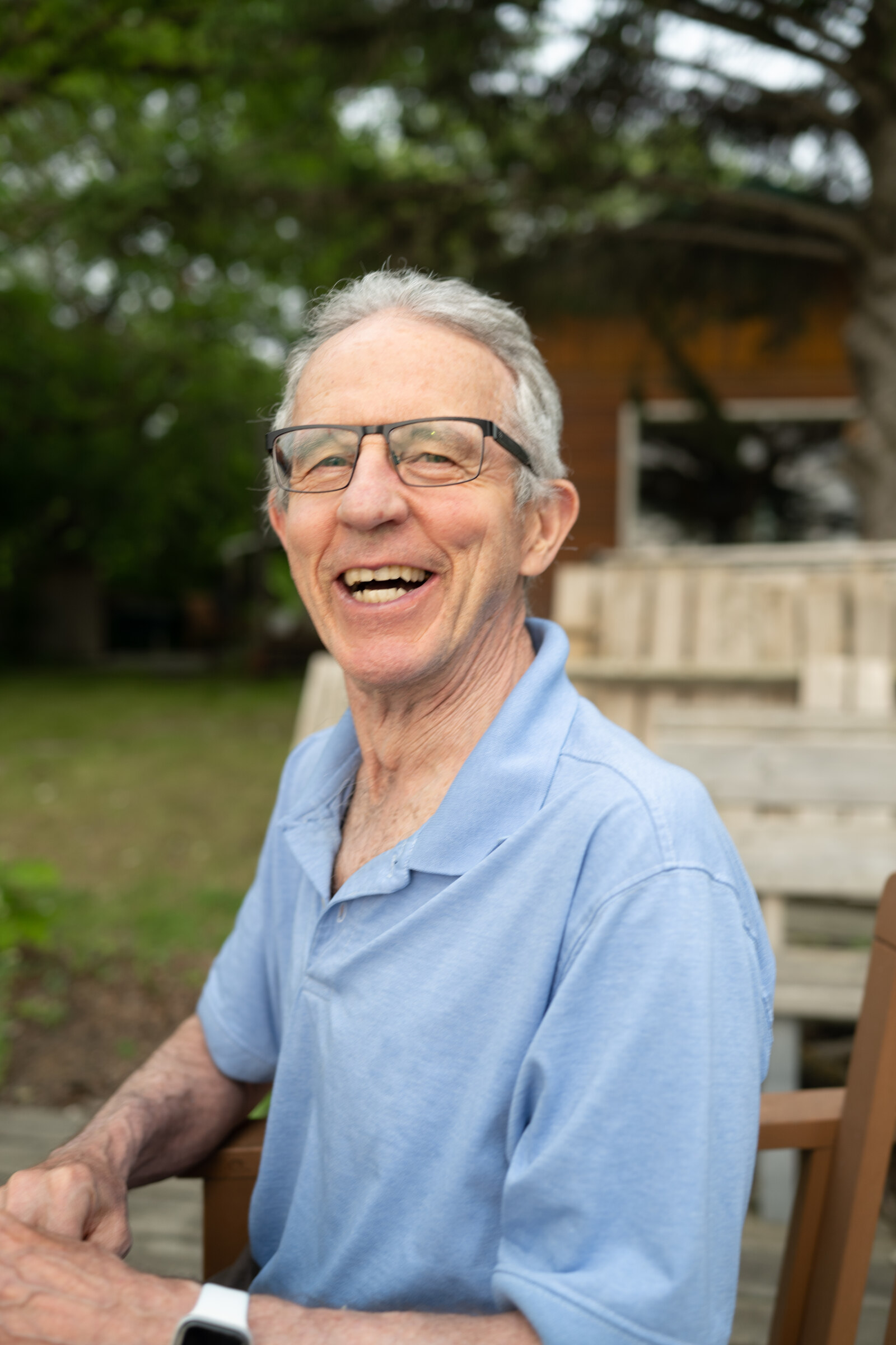 Dennis Robinson smiling outdoors