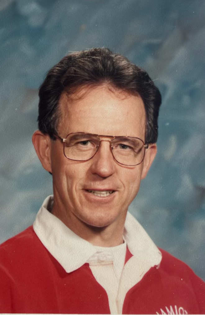 Portrait of a young Dennis Robinson